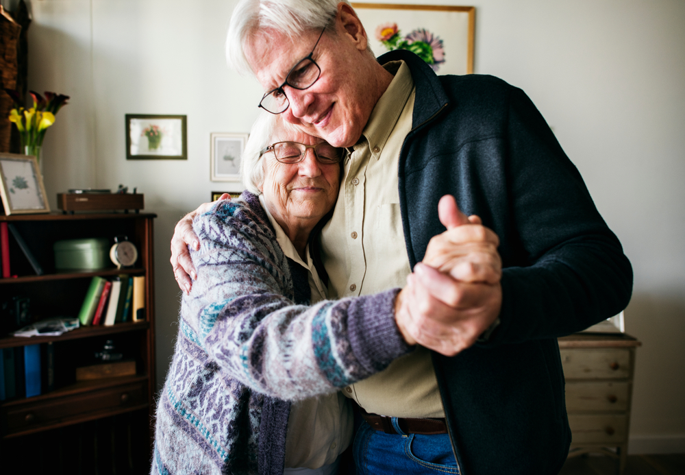 Senior couple in assisted living suite