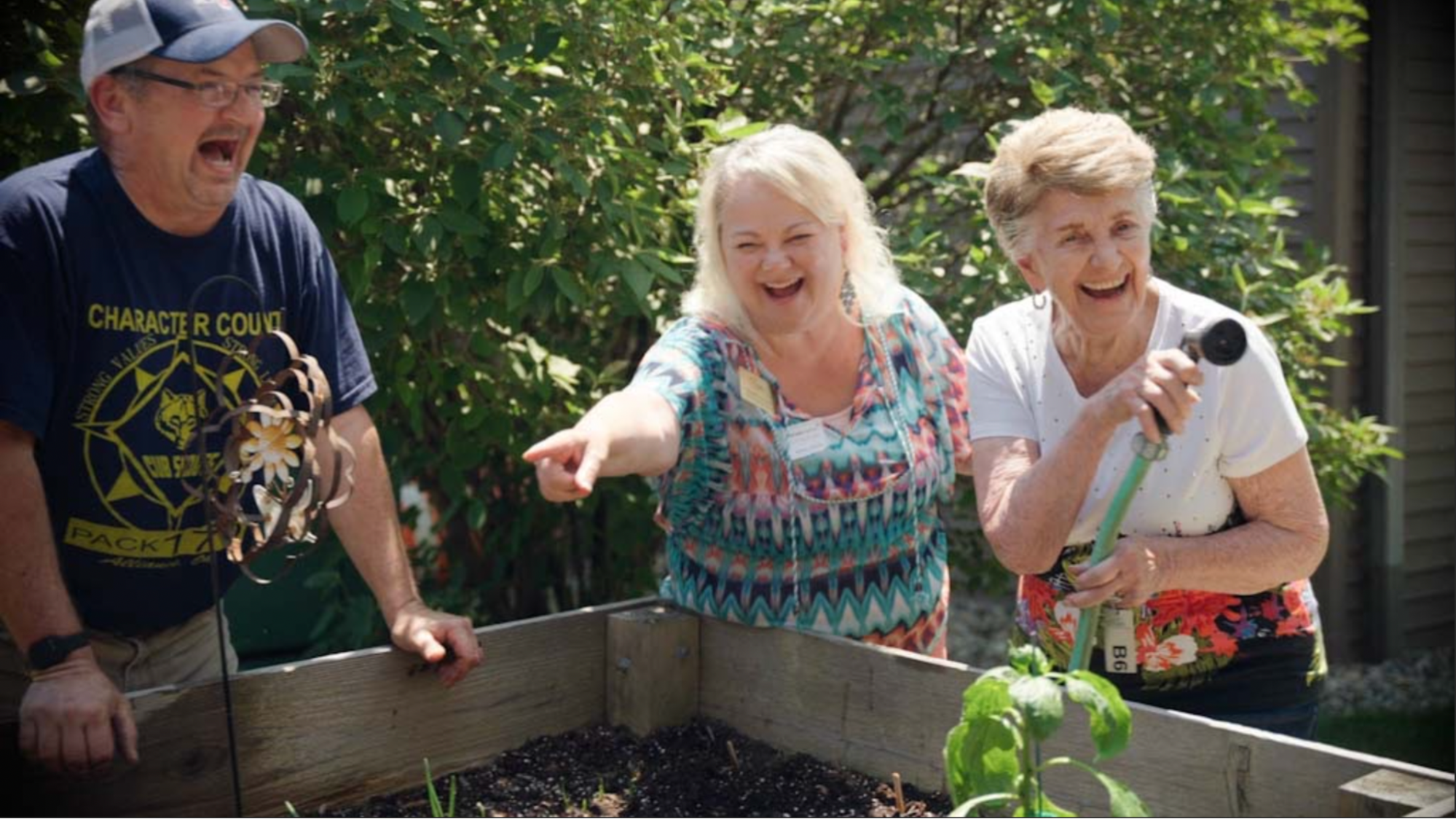 Residents watering garden